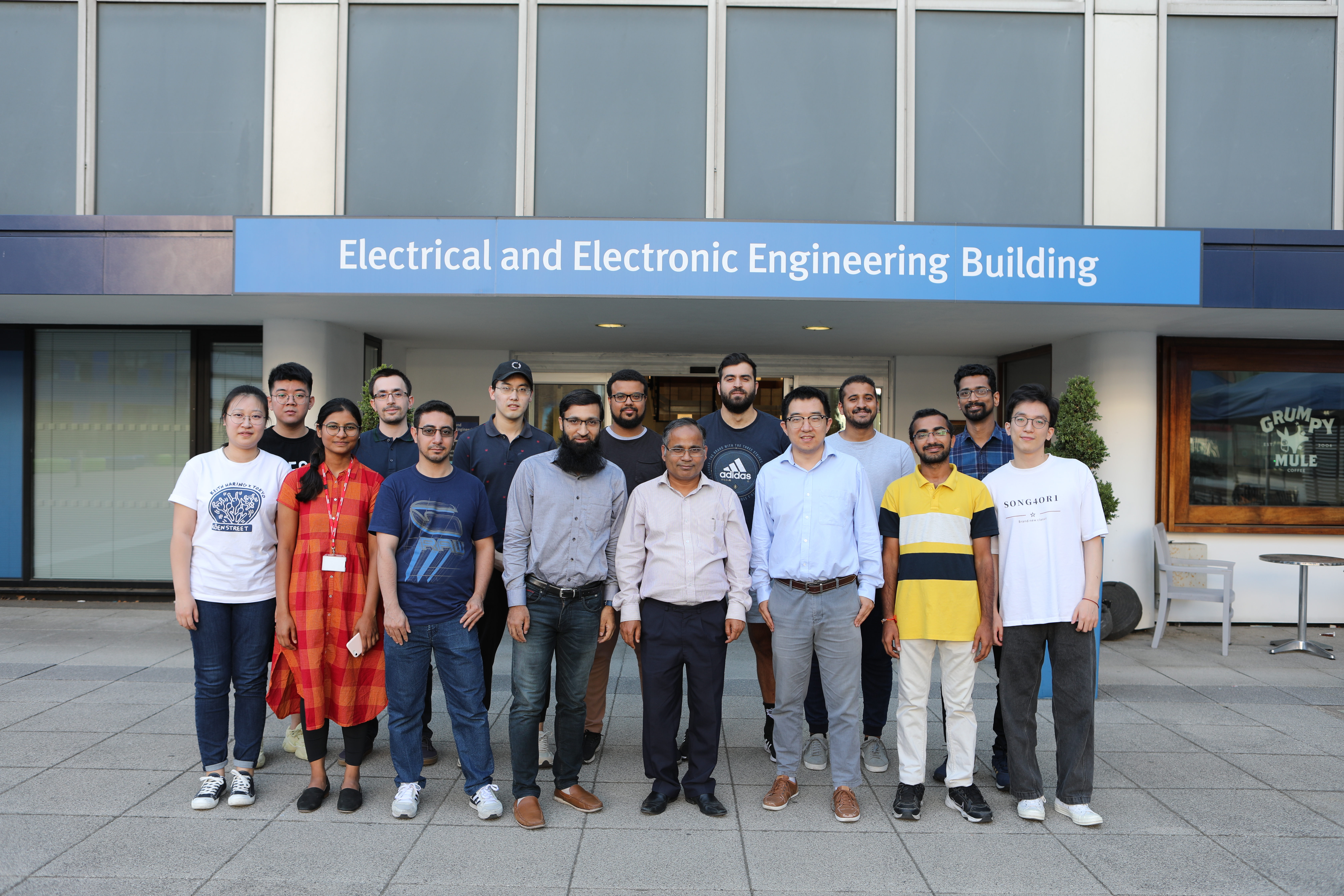 the memebers of Prof Bikash are standing infron of IEEE building