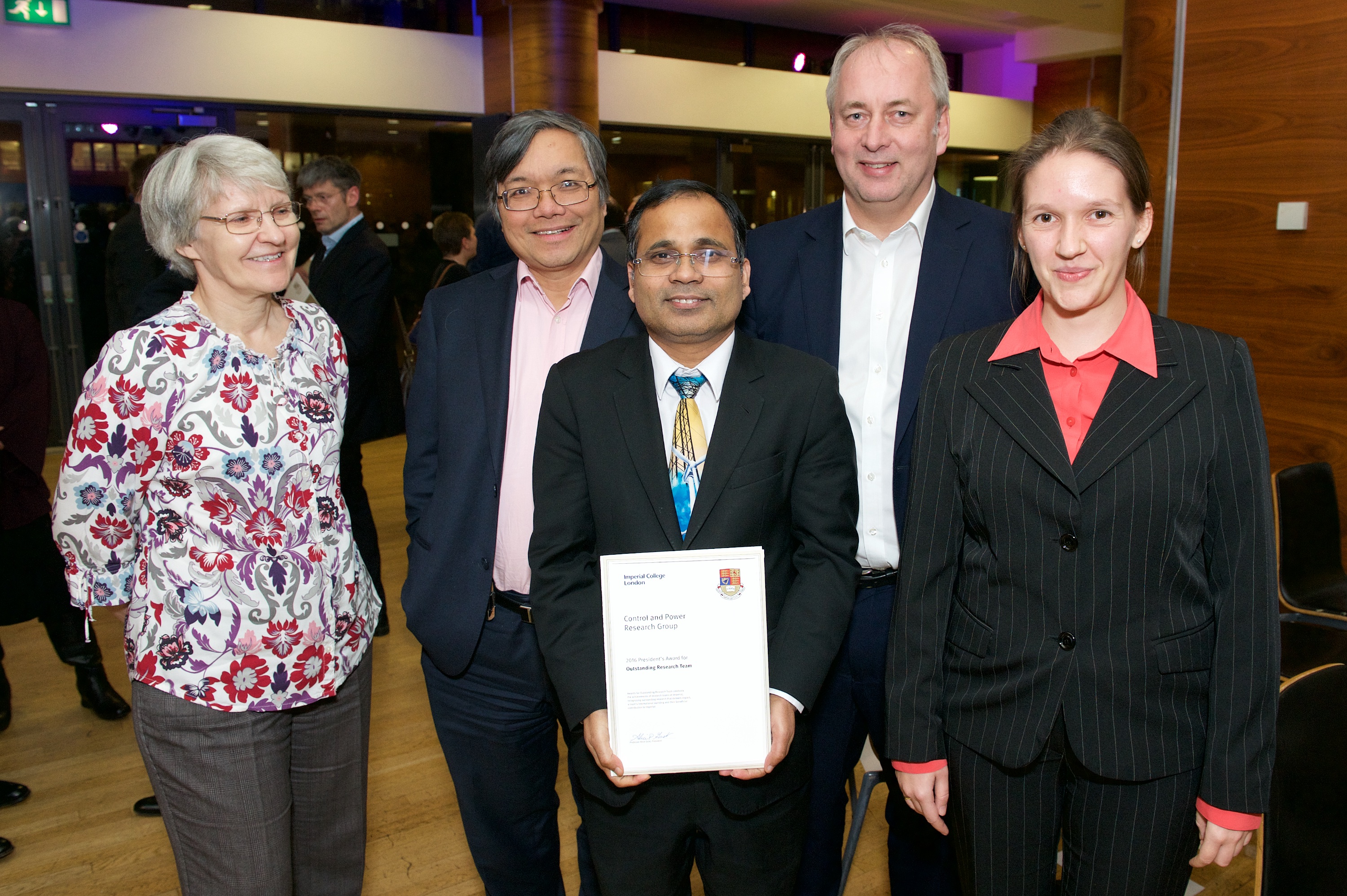 Prof Pal displaying the best research group award
